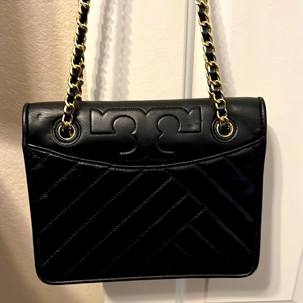 Tory Burch black Alexa convertible shoulder bag.